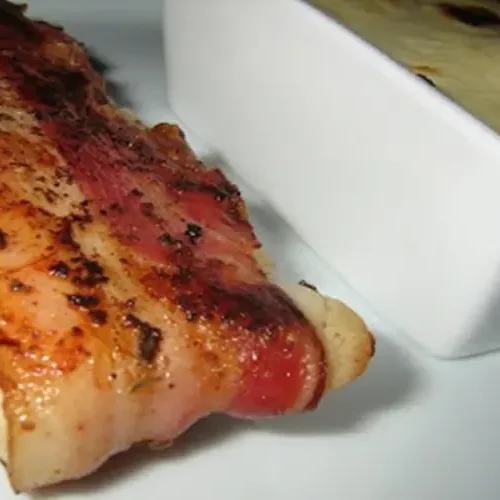 Receita de Embrulhinhos de Pescada e bacon com Puré de Cenoura Gratinado